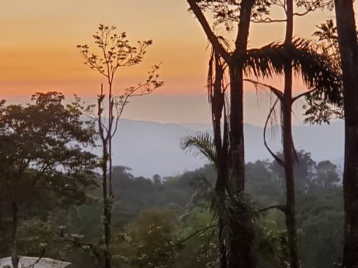 Sunset over the highland ridge from the land